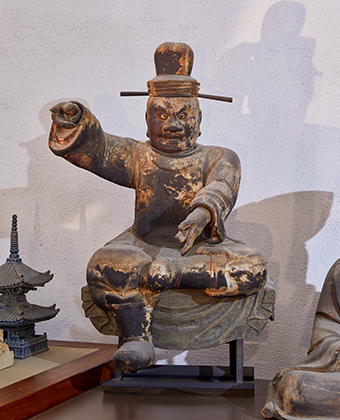 The wooden seated statue of Shiroku Bosatsu 